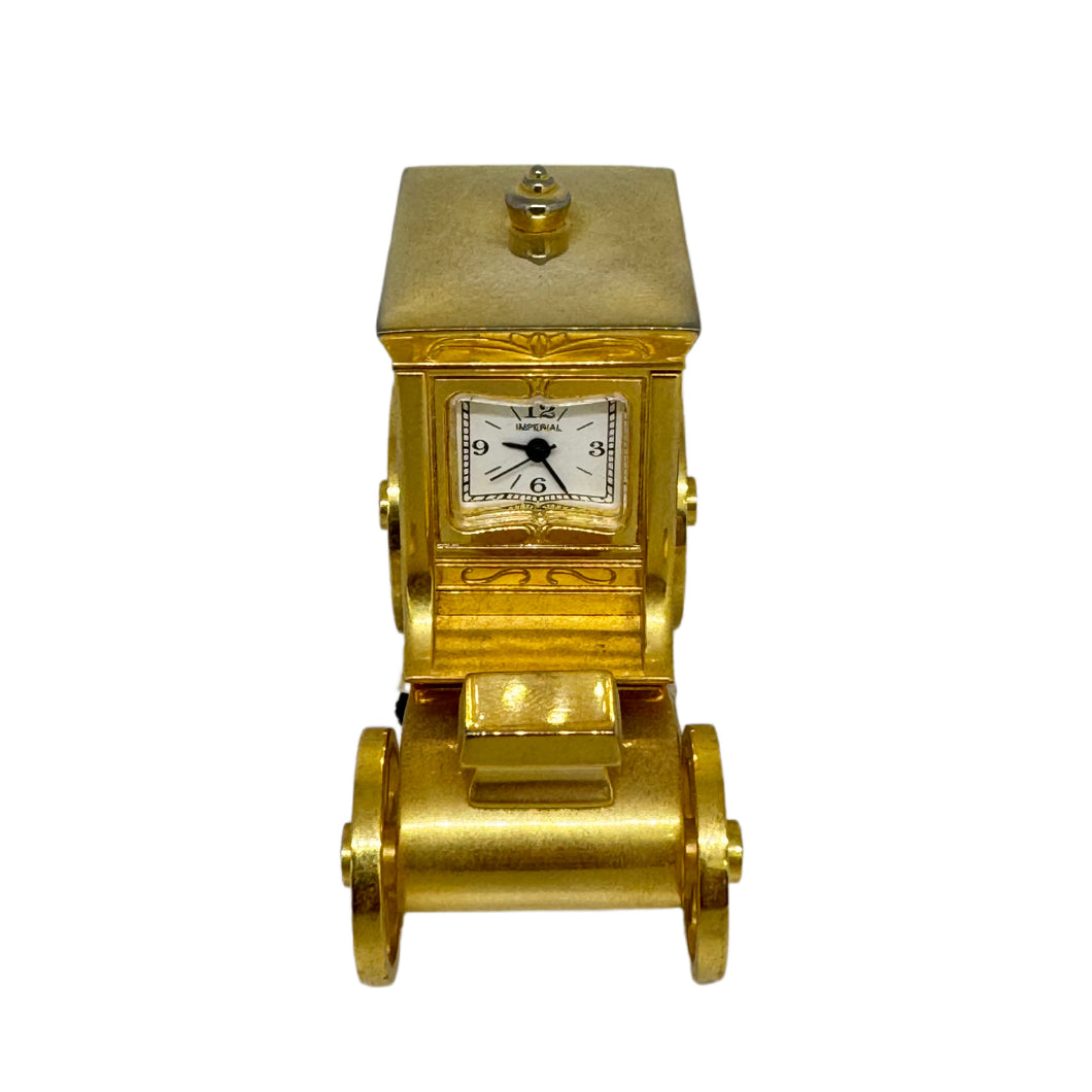IMP 83 Gold colored Miniature Hackney Carriage clock