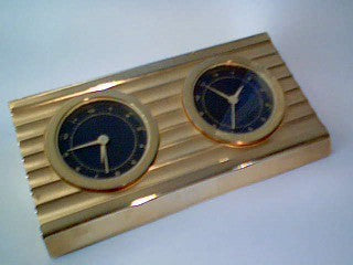 IMP 407  Gold coloured Duo wedge shaped clock