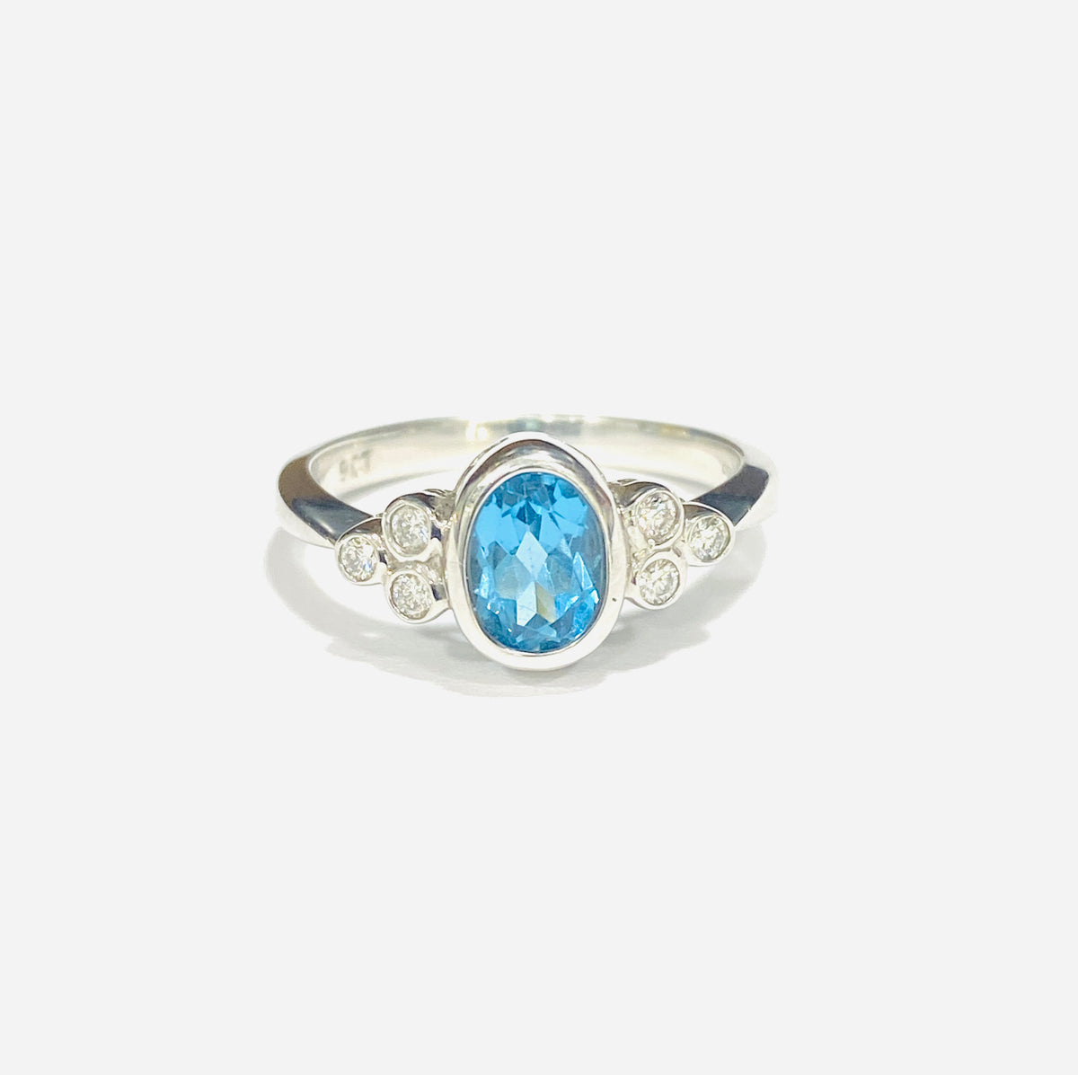 9ct White Gold Blue Topaz & Diamond Dress Ring