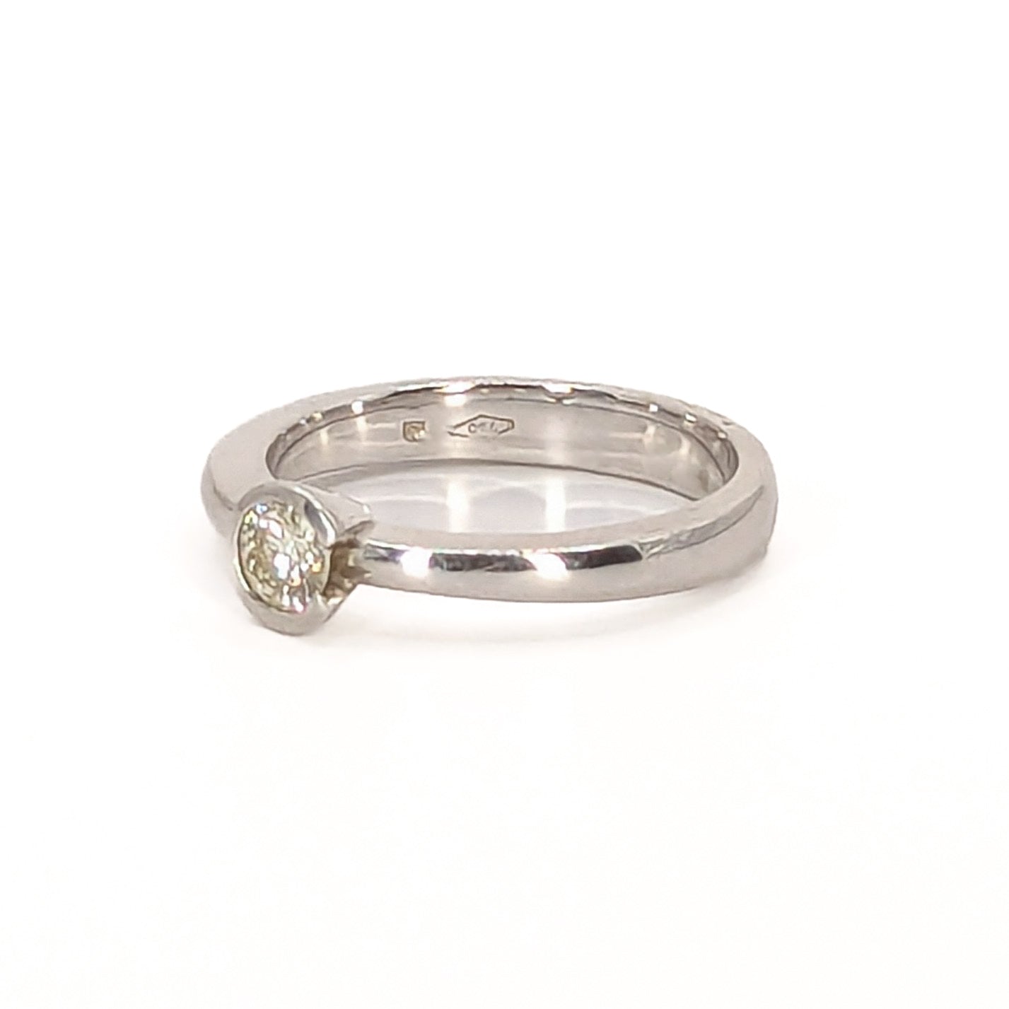 18ct White Gold Diamond Solitaire Ring in Wrap Around setting